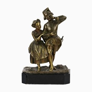 Figura pareja romántica de bronce
