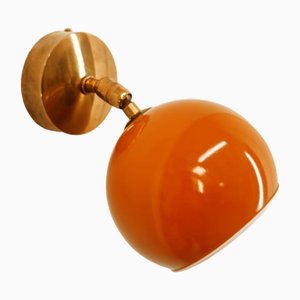 Adjustable Sconce with Orange Metal Dome