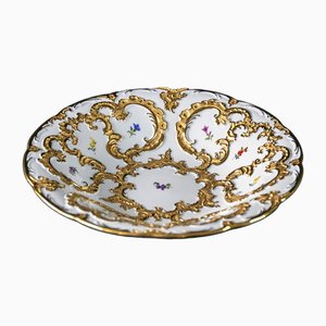 Piatto Meissen in porcellana dorata e floreale