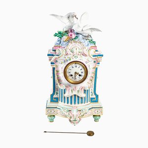 Reloj de porcelana de principios del siglo XX