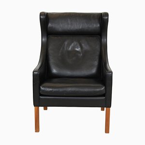 Sillón de orejas de cuero negro patinado de Børge Mogensen para Fredericia, años 80