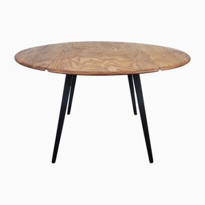 Round Black Leg Drop Leaf Dining Table attributed to Lucian Ercolani for Ercol, 1960s