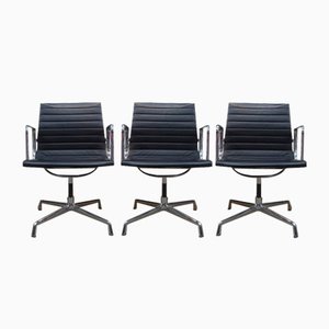 Vintage EA108 Pivoting Armchairs in Black Leather from Charles and Ray Eames for Vitra, 1999, Set of 3