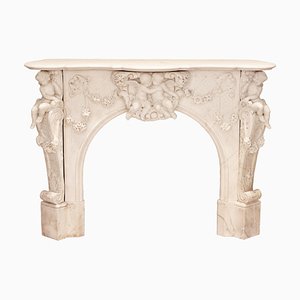 French Louis XV Style White Marble Fireplace with Cupids, 1800s