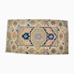 Tappeto intrecciato a mano con decorazioni rustiche