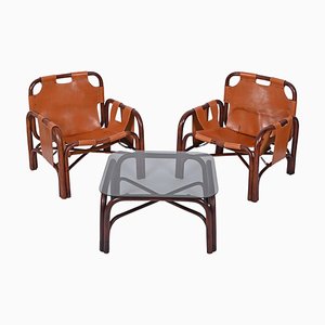 Italienische Mid-Century Sessel und Tisch aus Bambus & Leder von Tito Agnoli, 1960er, 3er Set