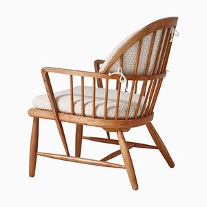 Scandinavian Modern Windsor Chair in Patinated Ash and White Bouclé by Hans J. Wegner, 1940s