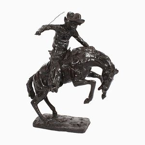Figura de vaquero del Lejano Oeste vintage de bronce según Remington, años 80