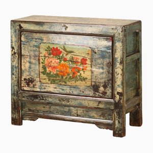 Mueble azul agrietado con pintura floral, años 20