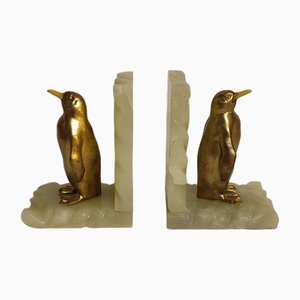 Sujetalibros de ónice y pingüino de metal dorado, España, años 60. Juego de 2