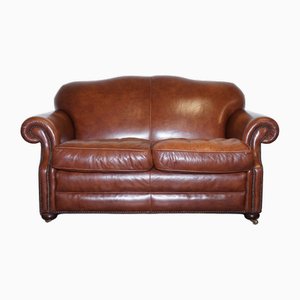 Sofá de dos plazas jorobado vintage de cuero marrón de Laura Ashley