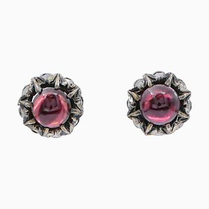 Aretes de oro rosa y plata con diamantes y granates, años 60. Juego de 2