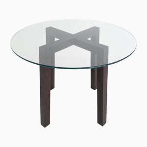 Runder Esstisch aus Holz mit Glasplatte