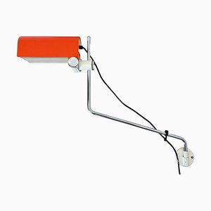 Lampada da parete regolabile in metallo arancione attribuita a Wilhem Braun-Feldweg Doria Light, Germania, anni '70