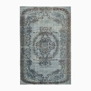 Tapis gris surteint