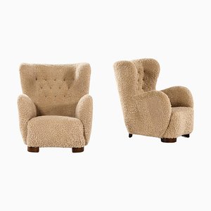 Set of Easy Chairs in Stained Beech and Lambskin, 1940s