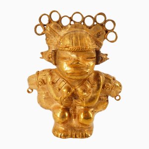 Estatuilla colombiana de la diosa Taïrona Tumbago con joyas