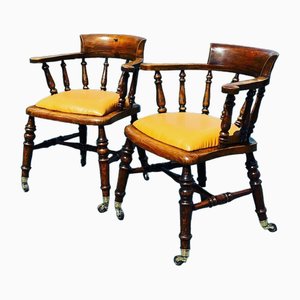 Set of Victorian Armchairs in Brass Castors