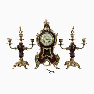Reloj de chimenea de péndulo pequeño de latón y bronce, Francia, década de 1880. Juego de 3
