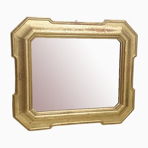 Espejo dorado antiguo