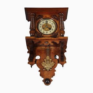 Reloj de pared de madera, década de 1880