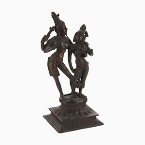 Scultura in bronzo di Krishna con Gopi