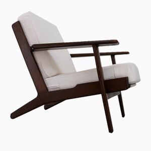 Vintage Danish Oak and Bouclé Ge290 Lounge Chair by Hans J. Wegner for Getama, 1960s