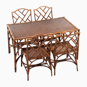 Mesa de comedor de ratán y bambú y cuatro sillas de comedor, años 70. Juego de 5