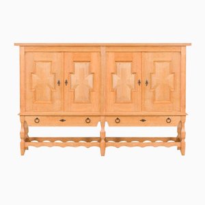 Credenza scultorea in quercia di Henning Kjærnulf, Danimarca, anni '70