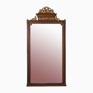 Specchio in stile neoclassico con cornice in legno dorato intagliato