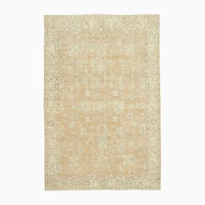 Alfombra vintage beige de lana