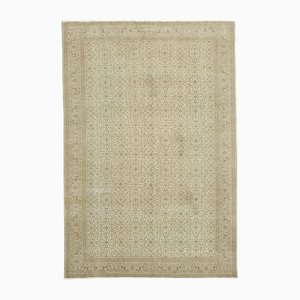 Alfombra vintage beige de lana