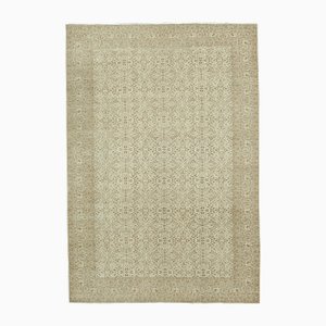 Alfombra vintage beige de lana