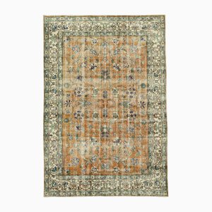 Alfombra vintage beige de lana