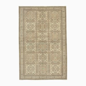 Alfombra vintage beige de lana