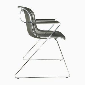Penelope Armchair in Black and Chrome Plated Metal by C. Pollock for Anonima Castelli, 1982
