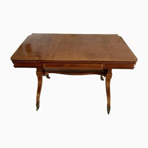 Mesa de comedor independiente Regency de caoba y madera satinada con incrustaciones, década de 1830