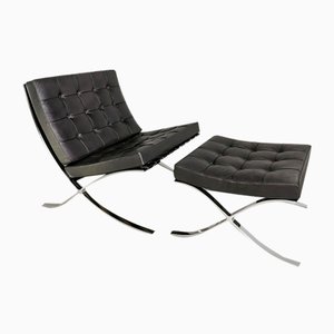 Barcelona Sessel und Fußhocker aus schwarzem Leder von L. Mies van der Rohe für Knoll, 1970er, 2er Set
