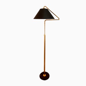 Height-Adjustable and Extendable Floor Lamp with Gold Lampshade