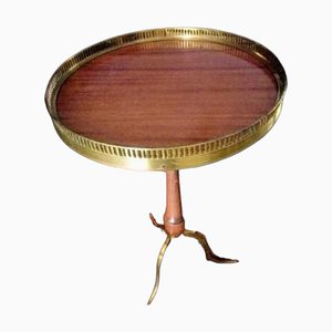 Round Table with Brass Trípod Legs and Edges