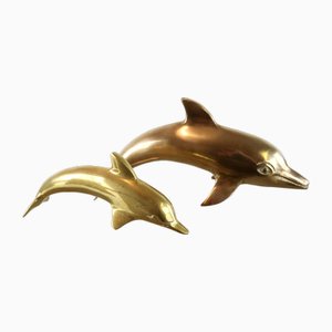 Delfines Mid-Century de latón. Juego de 2