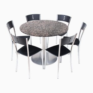 Tavolo da pranzo vintage in granito e sedie da pranzo in metallo cromato nero, anni '90, set di 7