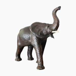 Escultura de elefante vintage de cuero con ojos de vidrio