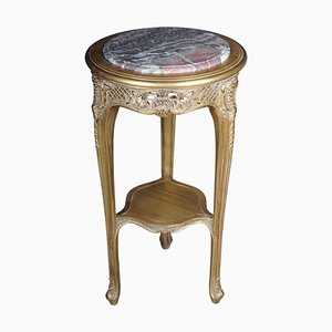 Mesa auxiliar Luis XV en oro tallado con tablero de mármol