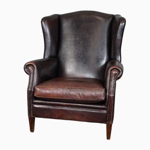 Dark Patinated Sheep Leather Lounge Chair
