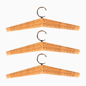 Mid-Century Iron and Rattan Coat Hangers in the style of Carl Auböck, 1960s, Set of 3