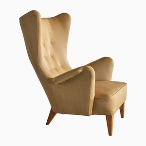 Poltrona Wingback in lana gialla e olmo attribuita a Gustav Axel Berg, Svezia, anni '40