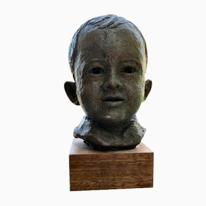 Busto modelo del artista de un niño sonriente muy joven