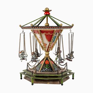 Carrusel musical de bronce esmaltado, década de 1800