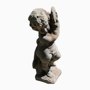 Verwitterte Statue eines Tamburin spielenden Putten, 1920er
